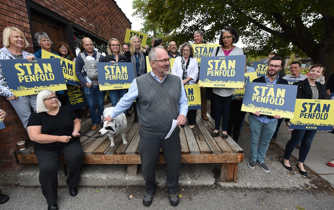 (Francisco Kjolseth  |  The Salt Lake Tribune)  Former Salt Lake City Councilman Stan Penfold is joined by his dog Ollie as announces his bid for mayor surrounded by supporters in the 9th East and 9th South area on Thursday, Oct. 4, 2018.