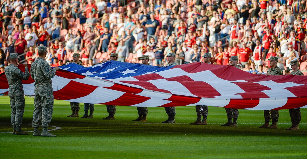 (Francisco Kjolseth  |  The Salt Lake Tribune)  In honor of the Fourth of July military personnel unfurl an American flag as Real Salt Lake hosts Columbus Crew SC, in MLS Soccer at Rio Tinto Stadium in Sandy, Utah on Wed, July 3, 2019.