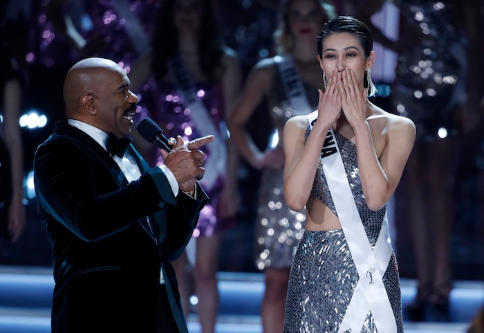 (John Locher | The Associated Press) Miss China Roxette Qiu reacts as she is interviewed by Steve Harvey at the Miss Universe pageant Sunday, Nov. 26, 2017, in Las Vegas.