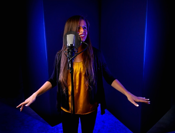 (Steve Griffin  |  The Salt Lake Tribune) BYU music student Nadia Khristean in the Salt Lake Tribune studio in Salt Lake City Wednesday August 2, 2017. Khristean performs songs and makes accompanying YouTube videos in partnership with local charities and cause-oriented organizations. She has made videos for such issues as refugee awareness, suicide prevention, homelessness, foster care and veterans affairs.  
