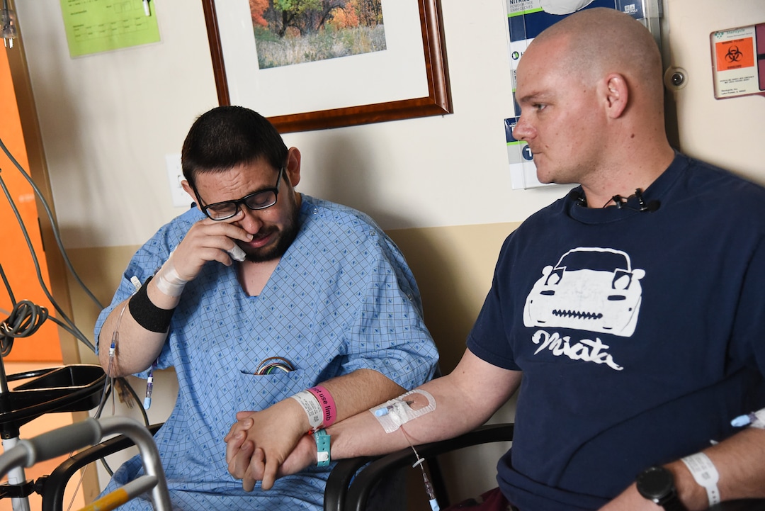 (Francisco Kjolseth  |  The Salt Lake Tribune)  Mitchell Salas becomes emotional as he meets Matthew Thompson for the first time after receiving a kidney from him as part of the Good Samaritan organ donor program. Both recovering from surgery a couple of days ago at Intermountain Medical Center in Murray on Friday, March 29, 2019. For Thompson the idea of donation started as a thought after hearing a motivational speaker talk about donating a kidney to his brother. 