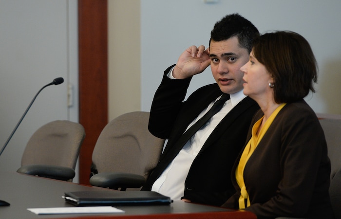 (Francisco Kjolseth  |  The Salt Lake Tribune)  Former Brighton High and University of Southern California linebacker Osa Masina is joined by his defense attorney Rebecca Hyde Skordas during his sentencing for sexual battery at the Matheson Courthouse in Salt Lake City on Tuesday, Dec. 5, 2017. Masina was sentenced to 365 days in jail, followed by two years on probation.