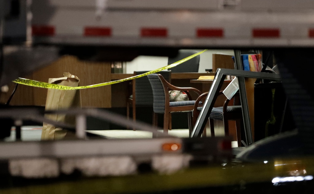 (Chris O'Meara  |  AP Photo)  Crime scene tape hangs inside the SunTrust bank Thursday, Jan. 24, 2019, in Sebring, Fla. Authorities say five customers were shot and killed in the bank on Wednesday.