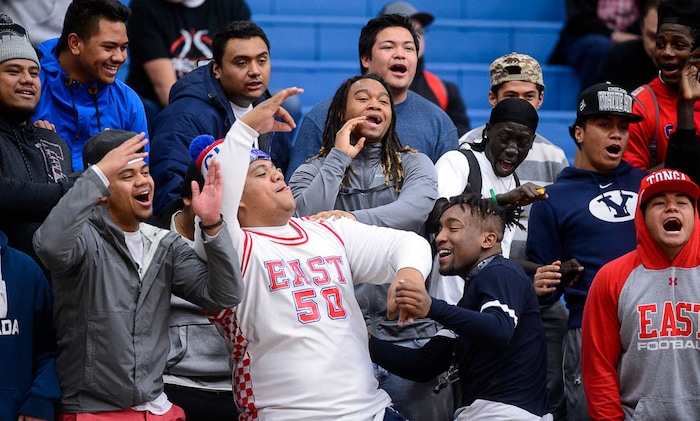 (Trent Nelson | The Salt Lake Tribune)  East fans celebrate in the final minute as East faces Viewmont in the 5A High School Girls' Basketball Tournament at SLCC in Taylorsville, Wednesday Feb. 21, 2018.