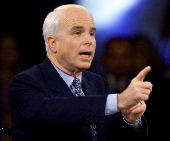 FILE - In this Feb. 15, 2000, file photo photo, then-Republican presidential candidate Sen. John McCain, R-Ariz., responds to a question during the Republican presidential debate sponsored by the South Carolina Business and Industry Political Education Committee, in Columbia, S.C. (AP Photo/Eric Draper, Pool)