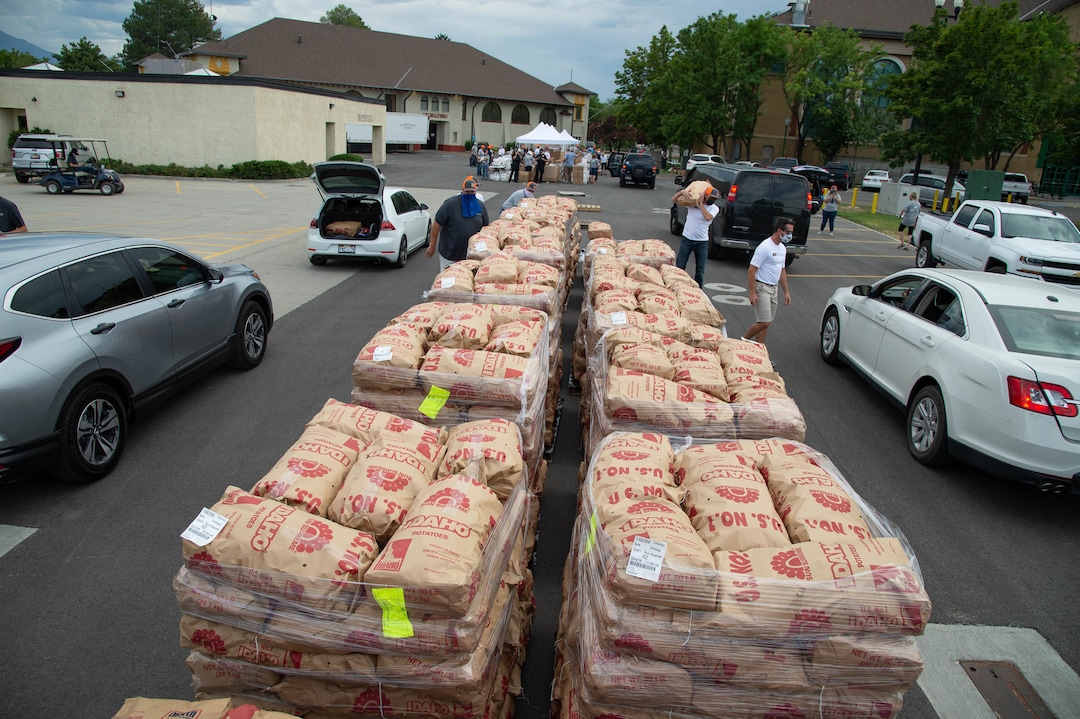 (Francisco Kjolseth  |  The Salt Lake Tribune) The third “Miracle Project” for the nonprofit foundation which raises money to purchase food produced by Utah farmers and then gives to residents in need, takes place at the Utah State Fairpark in Salt Lake City on Monday, July 27, 2020. The food donation from the Utah Farm Bureau’s “Farmers Feeding Utah” program provided food for 600 individuals and families who have recently become unemployed due to the coronavirus.