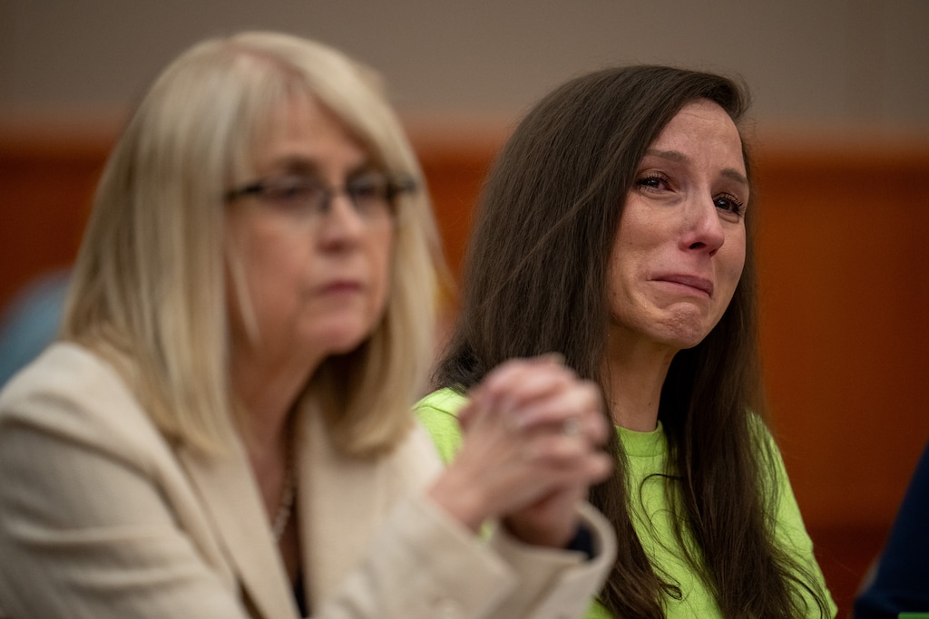 (Trent Nelson  |  The Salt Lake Tribune) Kouri Richins reacts as her brother, Ronney Darden, speaks on her behalf during her sentencing hearing in 3rd District Court in Park City on Wednesday, May 13, 2026. At left is defense attorney Wendy Lewis.