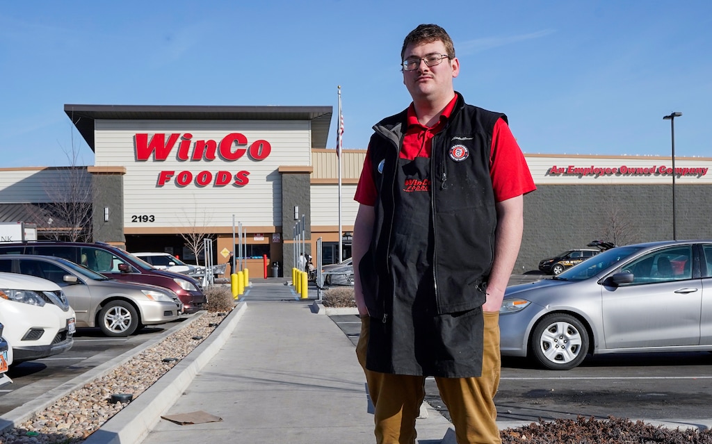 (Chris Samuels | The Salt Lake Tribune) Elliot Goble poses for a photograph in South Salt Lake, Monday, Feb. 12, 2024. Goble is among employees that have helped form WinCo’s first unionized retail employees.