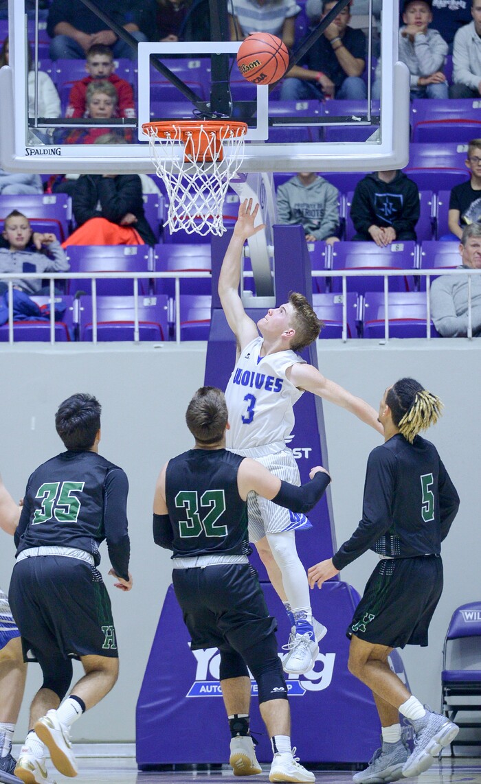 (Leah Hogsten  |  The Salt Lake Tribune) Fremont's Cade Hadley (03) had 12 points and 5 rebounds during the game. Fremont defeated Hillcrest 62-52 in the 6A High School Boys' Basketball Tournament opening game at Weber State University’s Dee Events Center in Ogden, Tuesday, Feb. 27, 2018. 