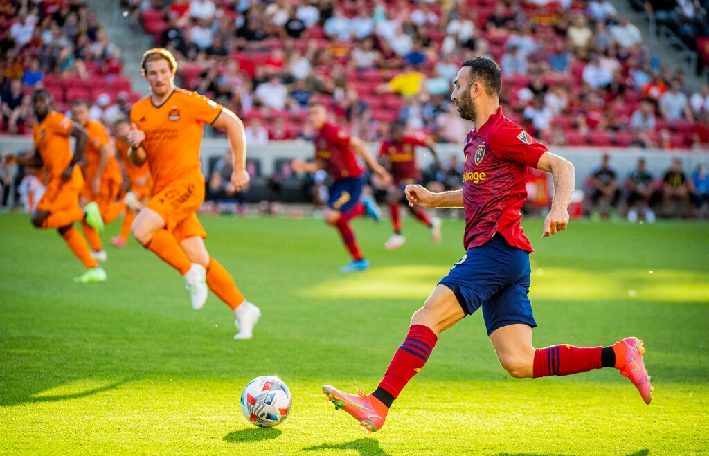 (Isaac Hale | Special to The Tribune) Real Salt Lake forward Justin Meram (9) drives the ball upfield during a MLS game between Real Salt Lake and Houston Dynamo FC at Rio Tinto Stadium in Sandy on Saturday, June 26, 2021.