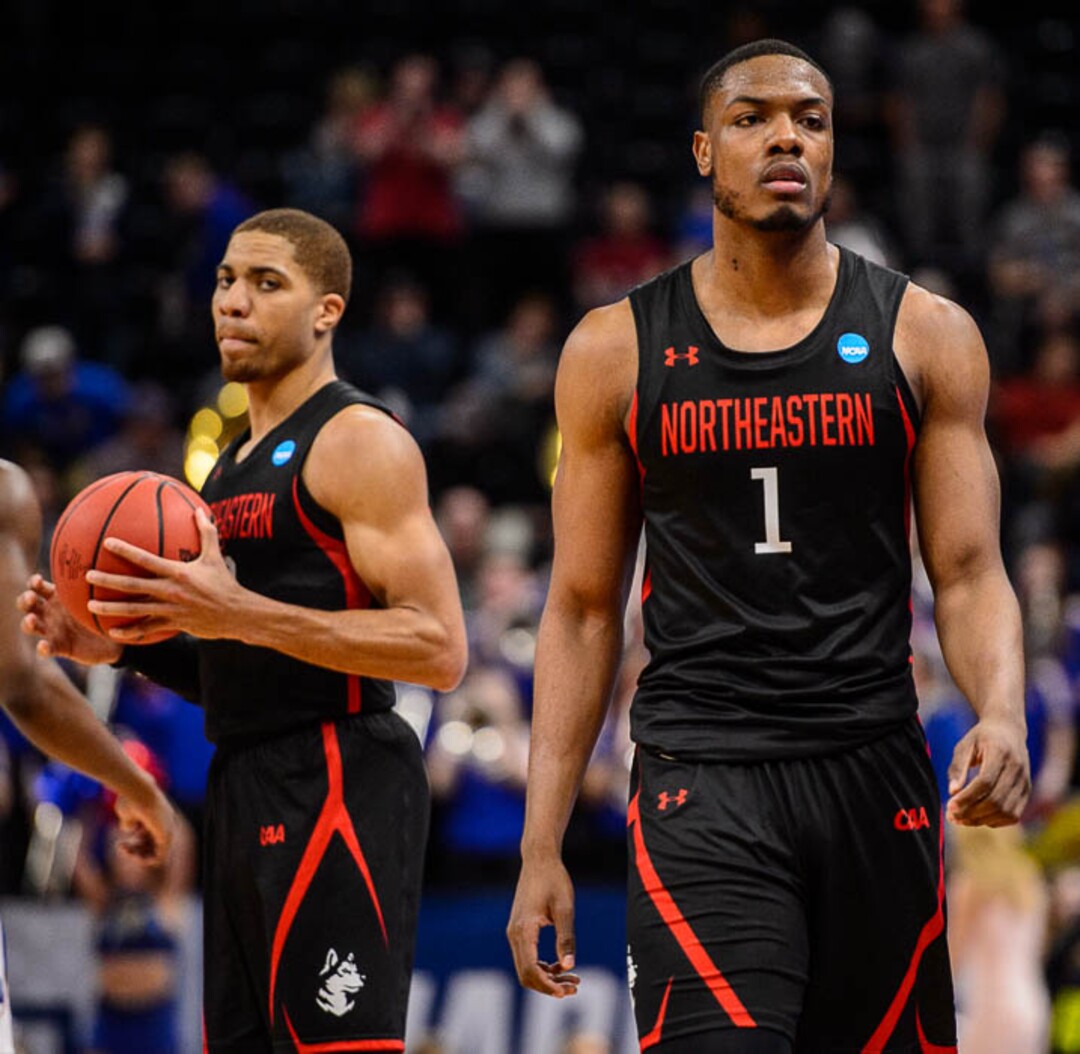 (Trent Nelson | The Salt Lake Tribune)  Northeastern Huskies guard Donnell Gresham Jr. (22) and Northeastern Huskies guard Shawn Occeus (1) as Kansas faces Northeastern in the 2019 NCAA Tournament in Salt Lake City on Thursday March 21, 2019.