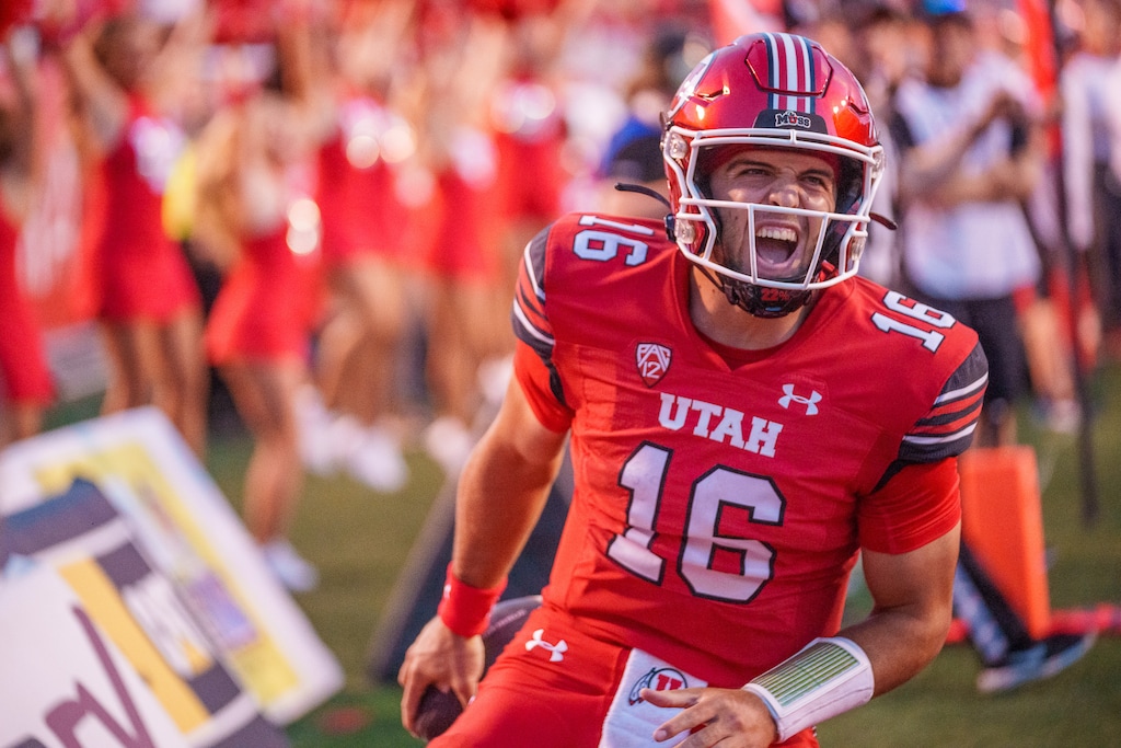 (Trent Nelson  |  The Salt Lake Tribune) Utah Utes quarterback Bryson Barnes (16) scores a touchdown as the Utah Utes host the Florida Gators, NCAA football in Salt Lake City on Thursday, Aug. 31, 2023.