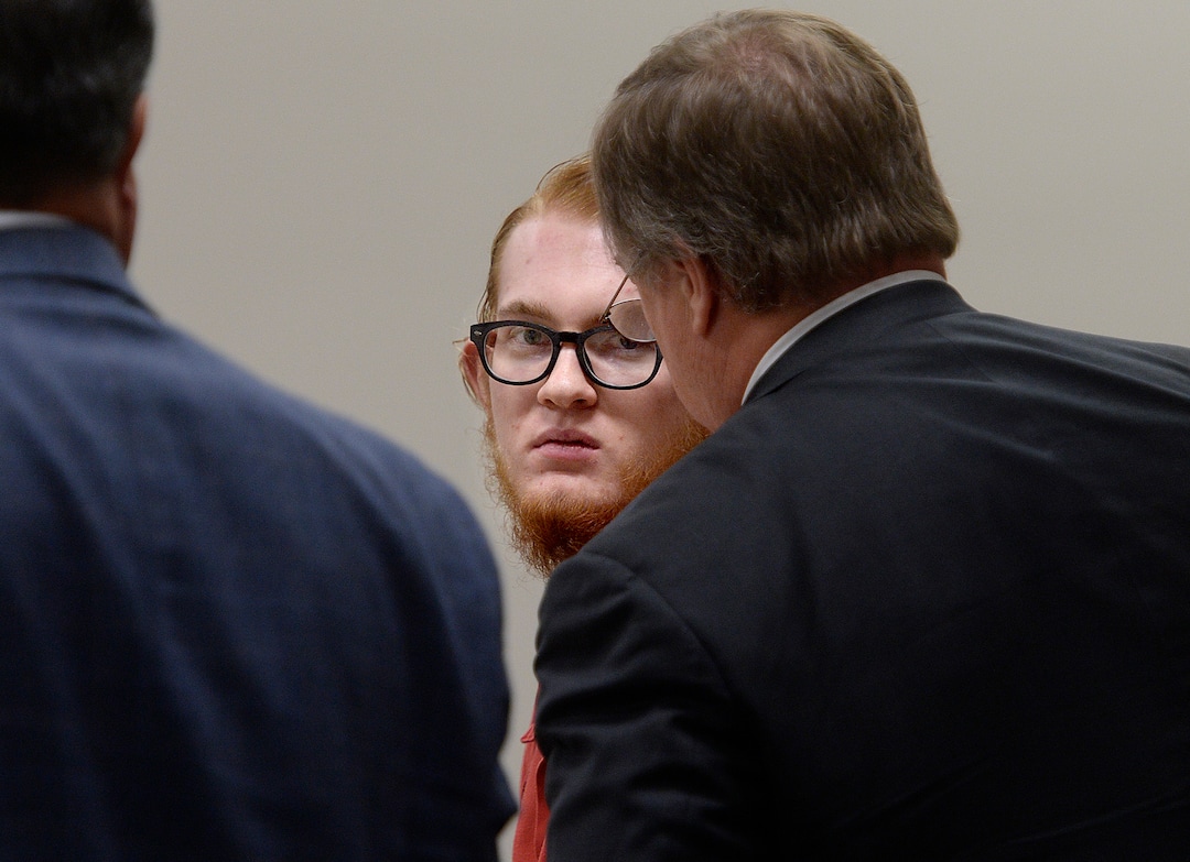 (Scott Sommerdorf   |  The Salt Lake Tribune)   Defendant Tyerell Joe Przybycien, 18, of Spanish Fork, speaks with his defense team as they leave for a break after the video showing the hanging death was shown during his preliminary hearing, Wednesday, August 23, 2017.  Przybycien is charged with first-degree felony murder for buying items used by a 16-year-old girl to hang herself on May 5 in Utah County.  Przybycien also recorded the girl's death, according to charges.