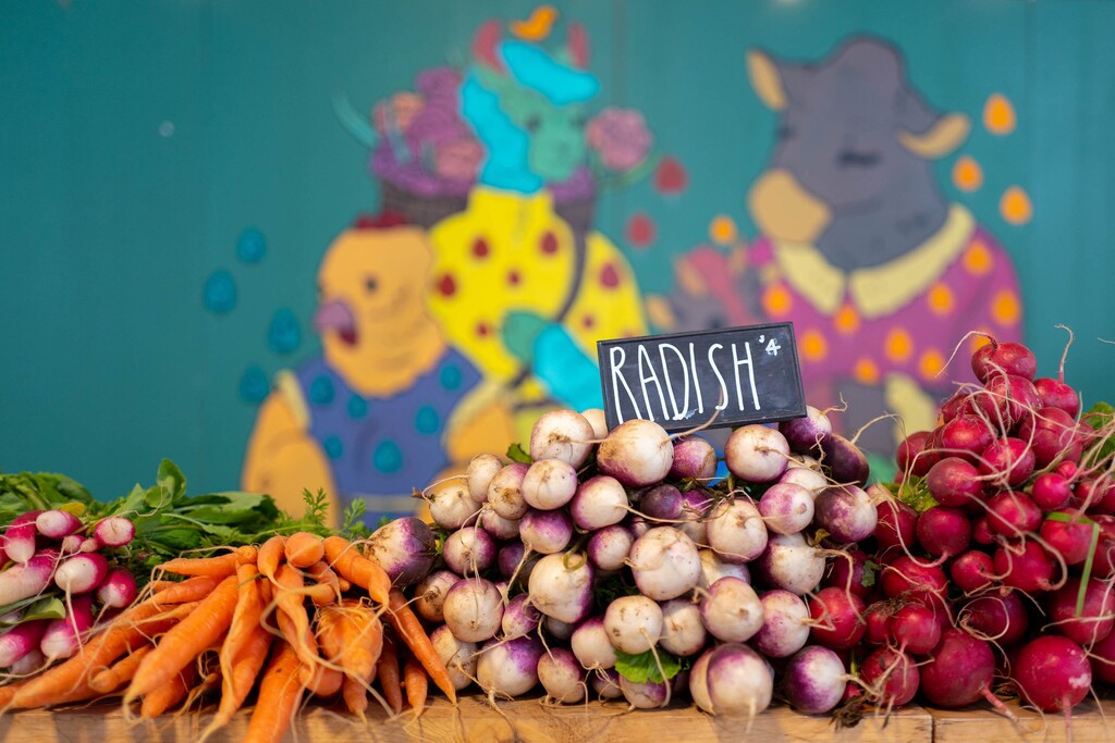 (Trent Nelson  |  The Salt Lake Tribune) The Mad Snacks Produce booth at Salt Lake City's Winter Market at The Gateway last year, on Saturday, Nov. 14, 2020.