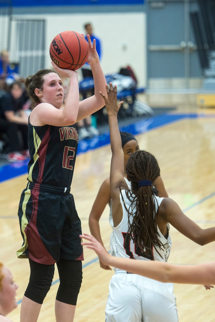(Chris Detrick | The Salt Lake Tribune) Viewmont's Mercedes Staples (12) shoots over Alta's Sydney Williams (14) during the game at Pleasant Grove High School Thursday, November 30, 2017. Viewmont defeated Alta 65-44.