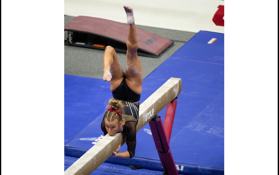 (Francisco Kjolseth  | The Salt Lake Tribune) Abby Paulson performs on the balance beam in PAC-12 gymnastics action Utah vs UCLA, at the Huntsman Center on Friday, Feb. 19, 2021.
