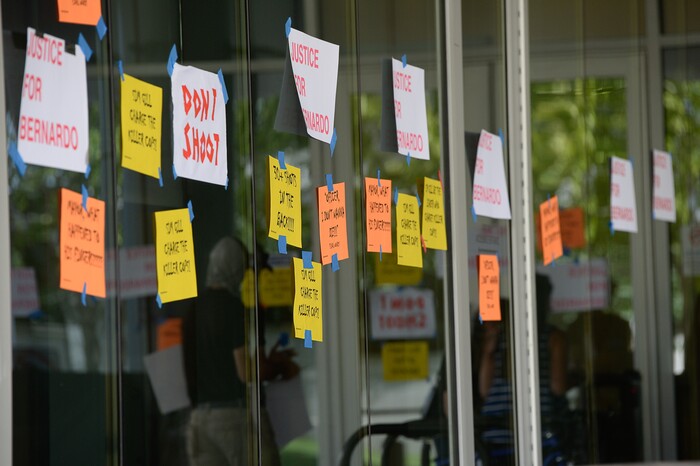 (Francisco Kjolseth  |  The Salt Lake Tribune) Demonstrators gather at the Salt Lake County District Attorney's office as they plaster the building asking for Justice for Bernardo Palacios Rally, on Thursday, June 18, 2020.