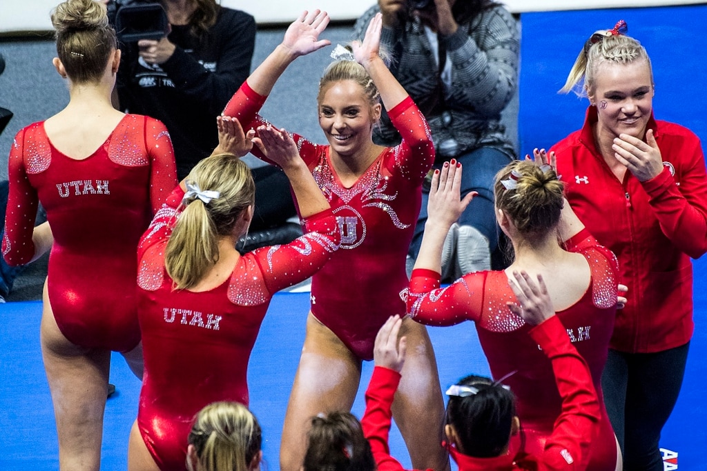 (Chris Detrick  |  The Salt Lake Tribune)  Utah's Mykayla Skinner celebrates with her teammates after competing on the beam during the gymnastics meet against Brigham Young University Friday, January 5, 2018.  