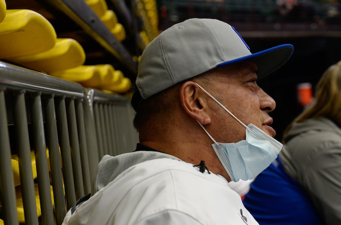 (Francisco Kjolseth  |  The Salt Lake Tribune)  Wayne Tarawhiti supports her daughter Kazna as she plays her quarterfinal match up against Syracuse at the UCCU Center at Utah Valley University on Thursday, Nov. 2, 2017, defeating them in three straight sets. Wayne is battling a form of blood cancer and keeps covered up due to a compromised immune system. 