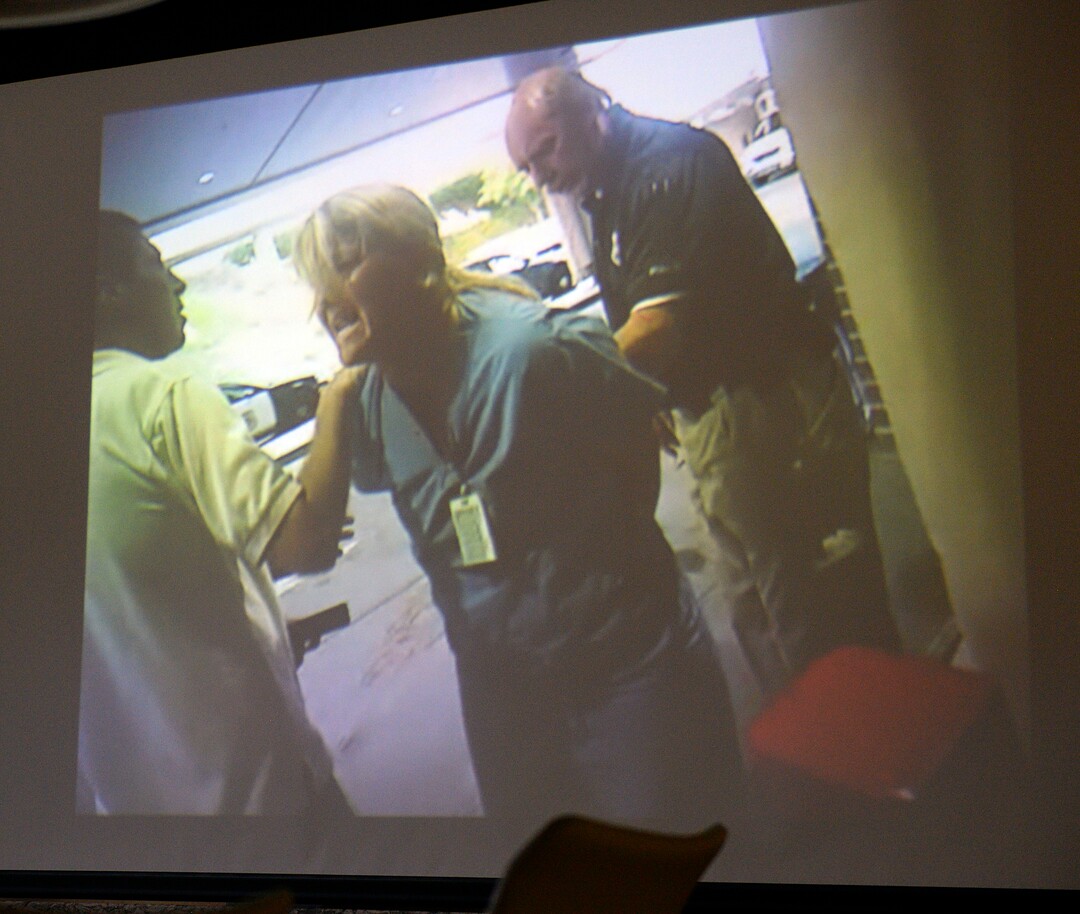 (Al Hartmann  |  The Salt Lake Tribune)                                                                                                                                      Still photo taken from previously undisclosed video of a Salt Lake City police officer assaulting and arresting University of Utah Hospital on-duty nurse Alex Wubbels for following her hospital’s policy on blood draws from an unconscious victim.   