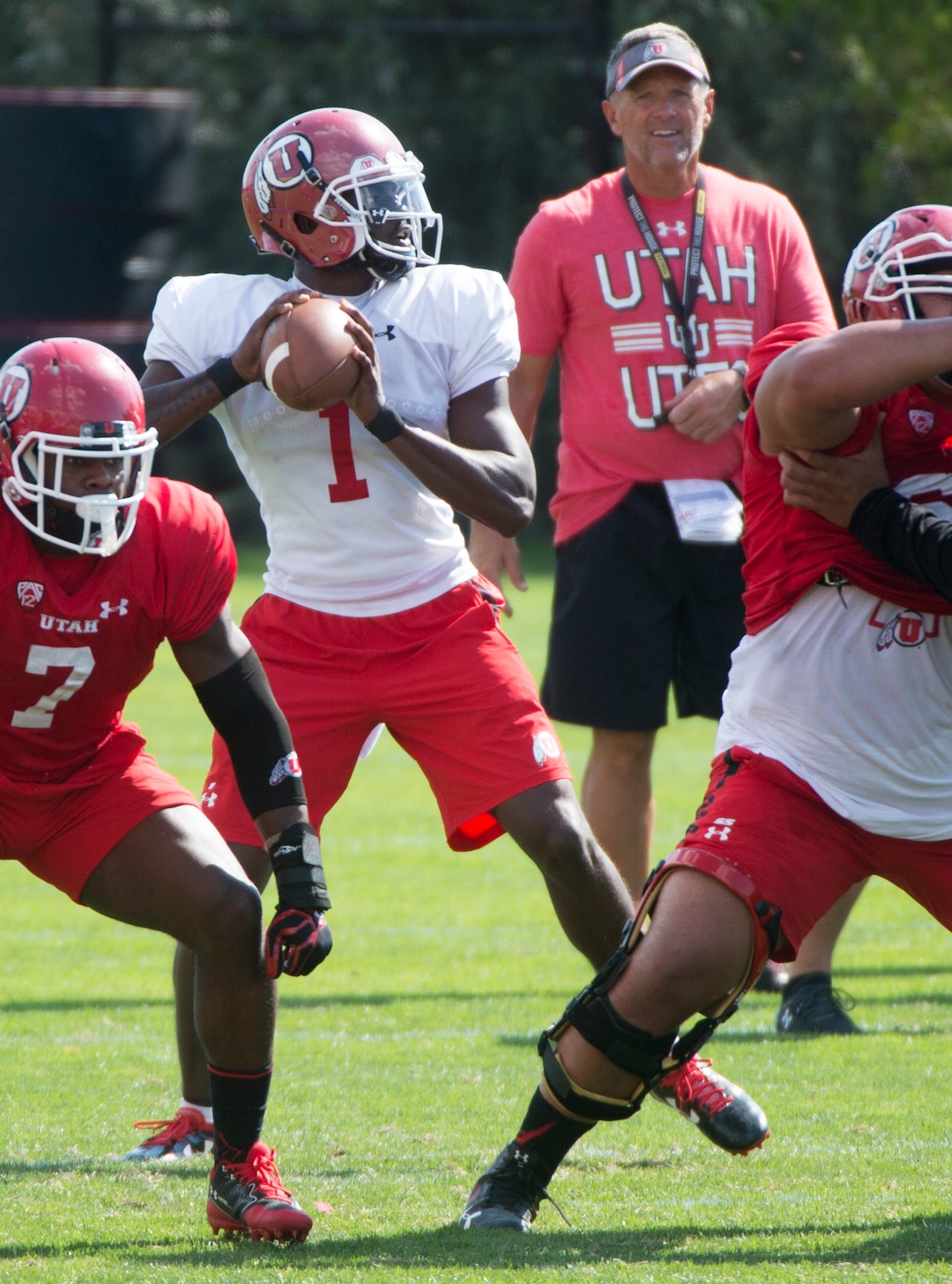 (Rick Egan  |  The Salt Lake Tribune)  University of Utah QB Tyler Huntley, (1) looks to pass, in football practice, Monday, July 31, 2017.
