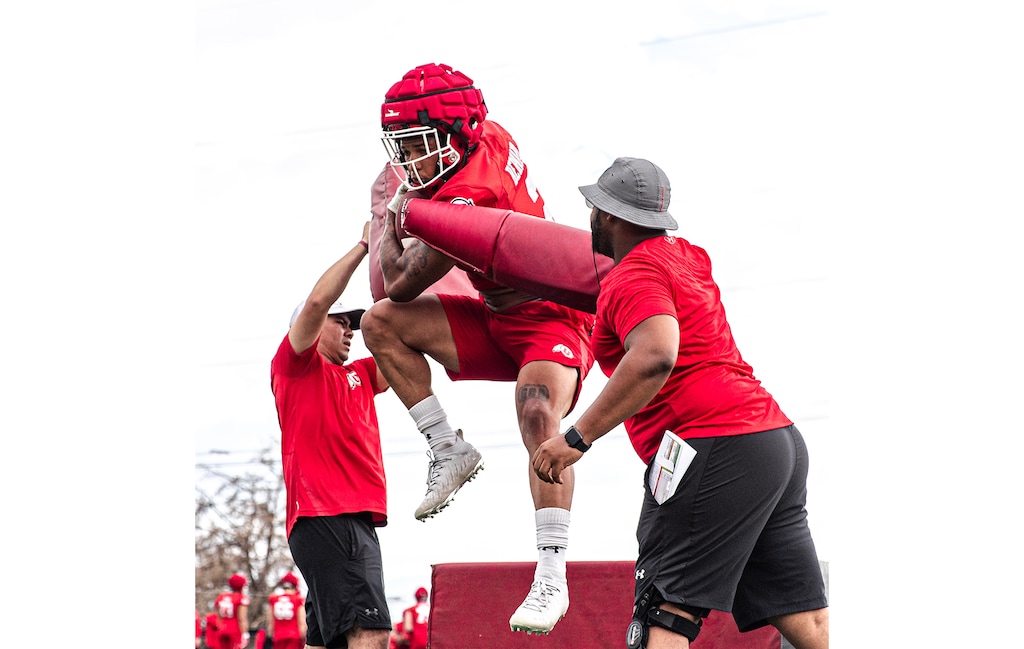 (University of Utah Athletics) University of Utah sophomore running back Micah Bernard leaps in the air during fall camp.