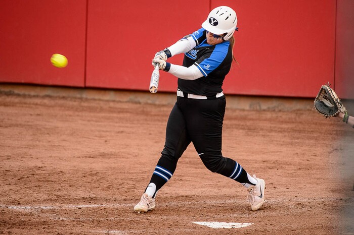 (Trent Nelson | The Salt Lake Tribune)  Utah Utes host the BYU Cougars, NCAA softball in Salt Lake City, Wednesday April 18, 2018. BYU infielder Bridget Fleener (13) knocks in two runs.