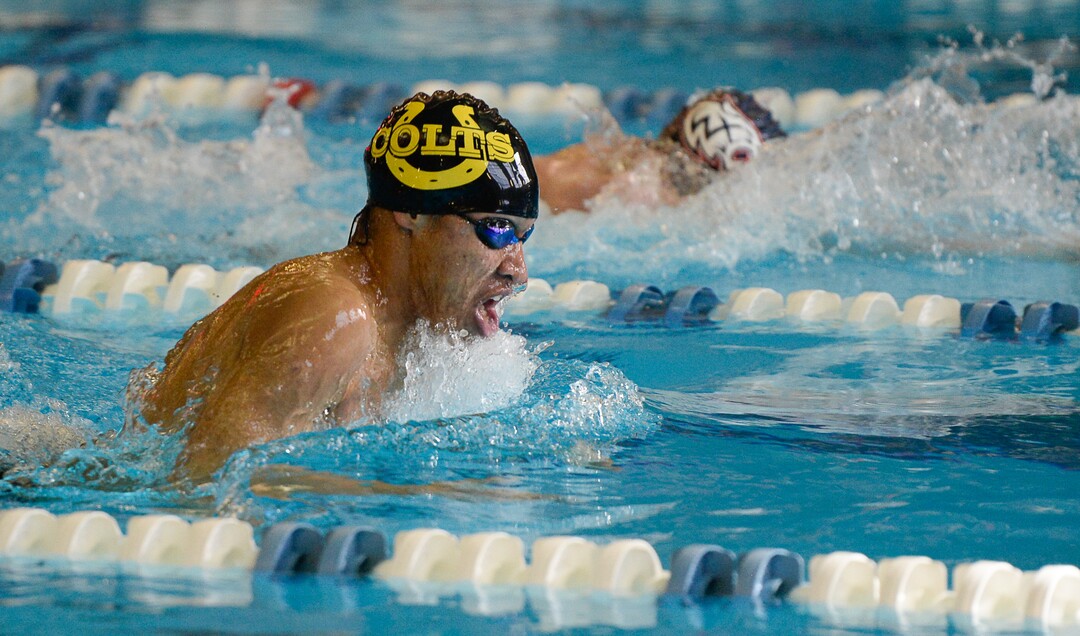 (Francisco Kjolseth  |  The Salt Lake Tribune)  Blayze Kimble of Cottonwood swims to a first win in the Men 200 Yard IM at the high school swimming 5A State Championships in Bountiful, Friday February 9, 2018.