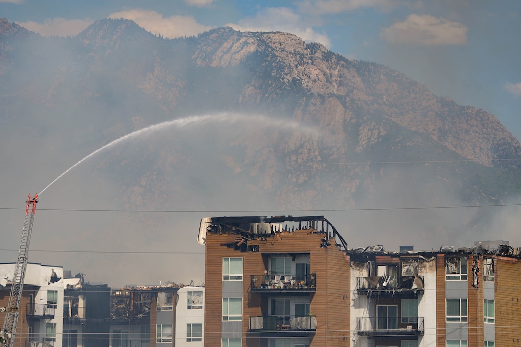 (Francisco Kjolseth | The Salt Lake Tribune) Crews battle a fire at North Union Apartments in Midvale on Friday, July 31, 2026.