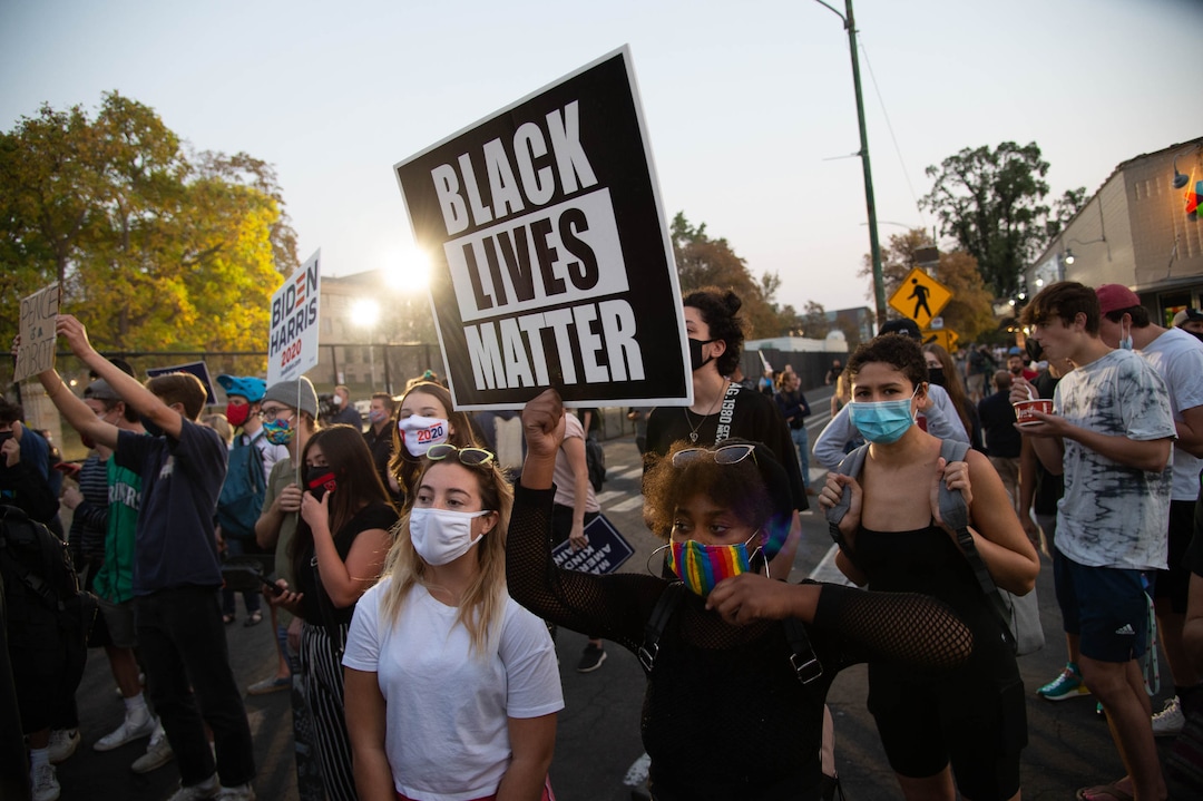 (Francisco Kjolseth  |  The Salt Lake Tribune) Supporters and counter protesters of President Donald Trump rally near Kingsbury Hall on the University of Utah campus in Salt Lake City on Wednesday, Oct. 7, 2020, during the vice presidential debate.