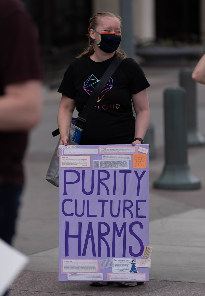 (Francisco Kjolseth | The Salt Lake Tribune) Aubree Stevens lends her voice as she joins dozens of protesters petitioning the First Presidency to repeal the excommunication of Natasha Helfer, a sex therapist who lost her membership in The Church of Jesus Christ of Latter-day Saints. "Out of respect for Natasha, this is a protest against the decision of the council, not a protest against the Church,” as they gathered outside the Church offices in a peaceful protest on Friday, May 7, 2021.
