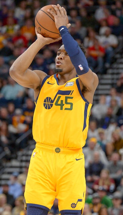 Leah Hogsten  |  The Salt Lake Tribune  Utah Jazz guard Donovan Mitchell (45) fires off a bucket as the Utah Jazz host the Philadelphia 76ers at Vivint Smart Home Arena, Thursday, December 27, 2018. 