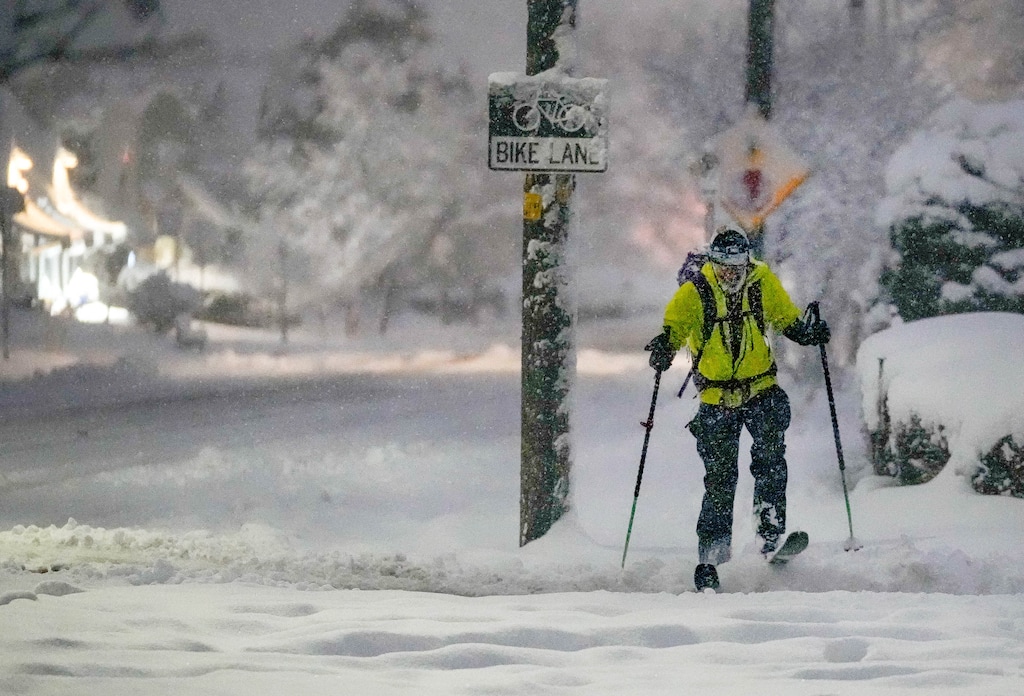(Francisco Kjolseth | The Salt Lake Tribune) Kai Benedict commutes to his job at the Salt Lake City VA Hospital by skis following a snowstorm that blanketed the Salt Lake Valley with snow on Wednesday, Feb. 22, 2023.