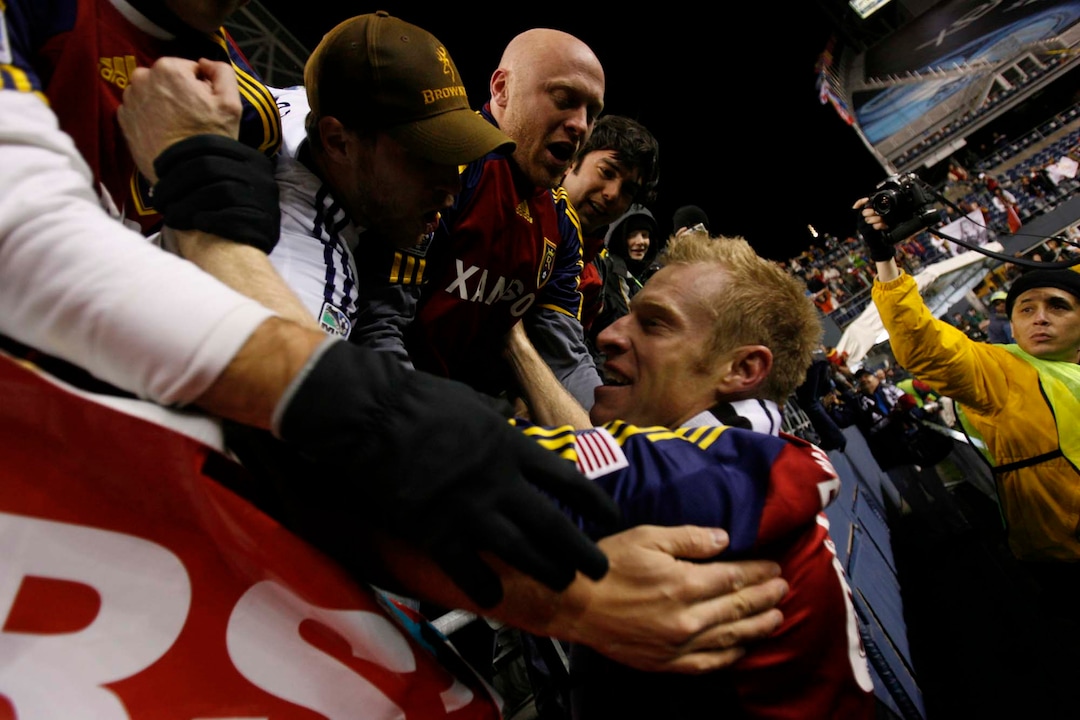 (Trent Nelson  |  Tribune file photo) Real Salt Lake defender Nat Borchers (6) celebrates with fans after the win. Real Salt Lake vs. LA Galaxy, MLS Cup Sunday, November 22 2009 at Qwest Field in Seattle.