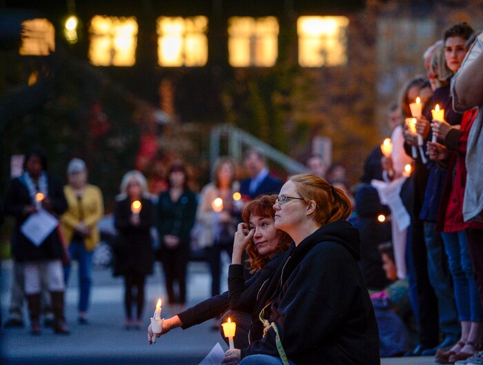 Leah Hogsten | The Salt Lake Tribune l-r Bernadette LeRoy and Leslie Phillips join their fellow community members outside Chabad Lubavitch of Utah as members of Utah's Jewish and interfaith communities hold a vigil and prayer service, Monday, Oct. 29, 2018 for the 11 people killed at the Tree of Life Synagogue in Pittsburgh.