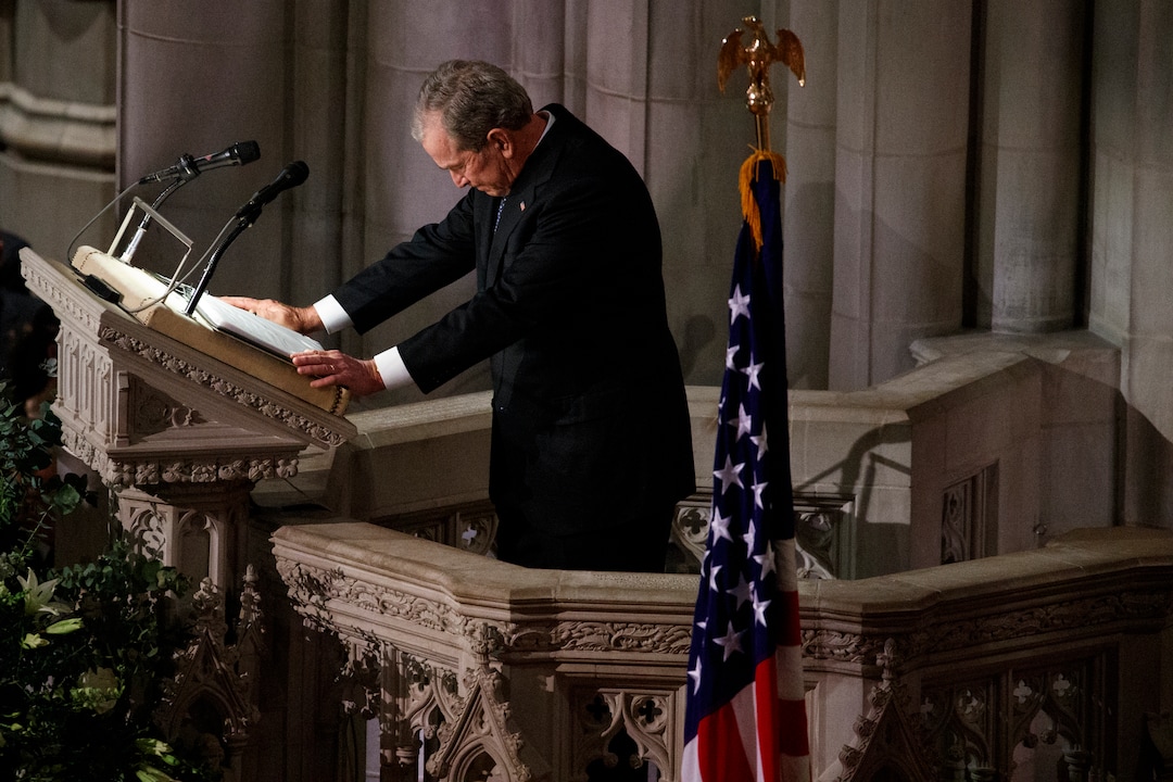 Former President George W. Bush fights back tears as he speaks during the State Funeral for his father, former President George H.W. Bush, at the National Cathedral, Wednesday, Dec. 5, 2018, in Washington. (AP Photo/Evan Vucci)
