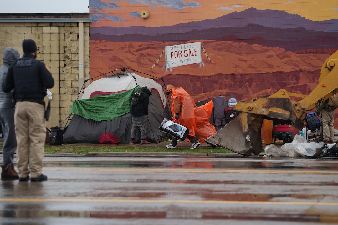 (Trent Nelson  |  The Salt Lake Tribune) Salt Lake County conducts a camp cleanup at the Fleet Block Murals in Salt Lake City on Wednesday, April 14, 2021.