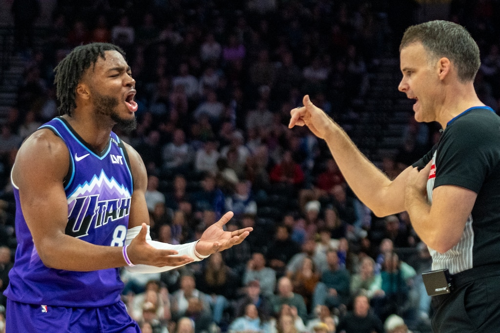 (Rick Egan | The Salt Lake Tribune) Utah Jazz guard Isaiah Collier (8) argues a call with referee Scott Twardoski (52).
