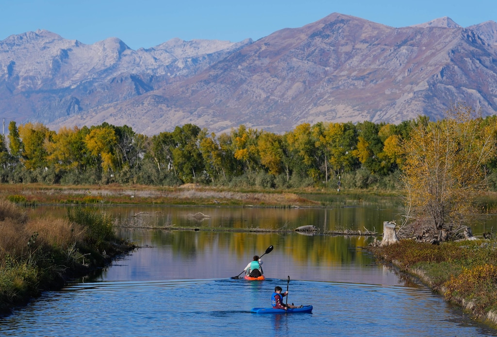 (Francisco Kjolseth  | The Salt Lake Tribune) Families venture out into the reconstructed Provo River Delta recreation area, where 58 acres of wetland habitat on the eastern shore of Utah Lake was restored, Saturday, Oct. 26, 2024.