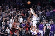 Utah Jazz guard Keyonte George (3) makes a three-point basket over Chicago Bulls guard Ayo Dosunmu to take the lead in the last seconds of the second overtime of an NBA basketball game, Sunday, Nov. 16, 2025, in Salt Lake City. (AP Photo/Rob Gray)