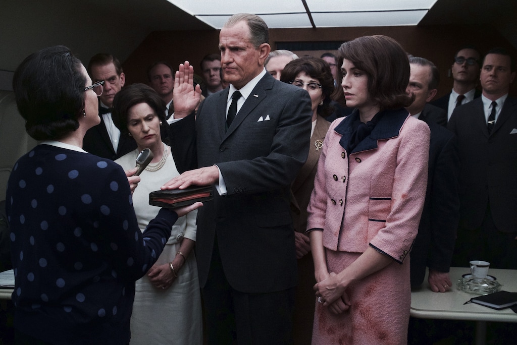 (Courtesy photo) Woody Harrelson (center) plays Lyndon Johnson, taking the oath of office as president after the assassination of John F. Kennedy, flanked by Lady Bird Johnson (Jennifer Jason Leigh, left) and Jackie Kennedy (Kim Allen, right), in a scene from director Rob Reiner's historical drama "LBJ."
