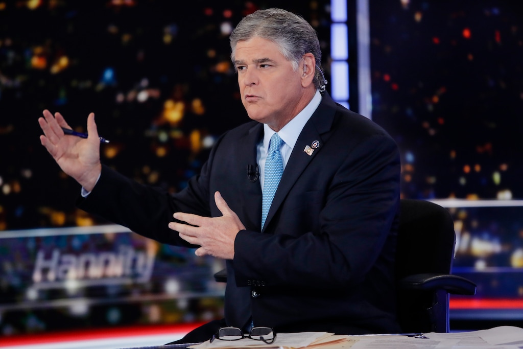 Fox News host Sean Hannity interviews Democratic presidential candidate and New York Mayor Bill de Blasio during a taping of his show, "Hannity," Wednesday, Aug. 7, 2019, in New York. (AP Photo/Frank Franklin II)