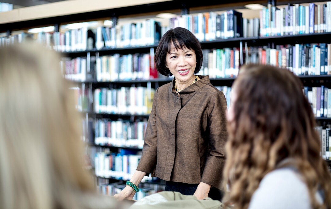 (Photo Courtesy of Jay Drowns/Utah Valley University) Utah Valley University President Astrid S. Tuminez is photographed with students on the UVU campus in Orem, Utah on Wednesday, June 1, 2018.