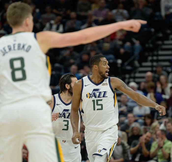 (Francisco Kjolseth  |  The Salt Lake Tribune)  Utah Jazz forward Derrick Favors (15) looks back at the Spurs after sinking a three pointer during the first quarter of an NBA basketball game in Salt Lake City, Thursday, Dec. 21, 2017.