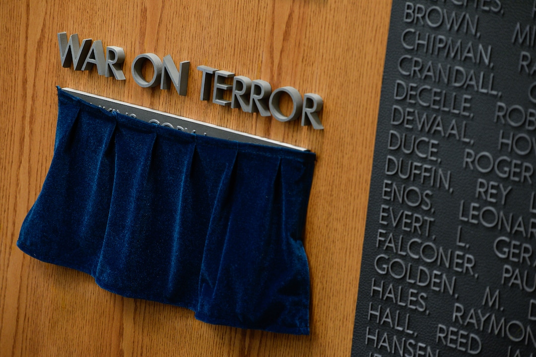 (Francisco Kjolseth  |  The Salt Lake Tribune)  Brigham Young University honors the life and legacy of Major Brent Taylor, former mayor of North Ogden and a BYU Army ROTC alumnus during a ceremony at the Ernest L. Wilkinson Student Center in Provo on Thursday, May 23, 2019 as his name remains temporarily covered before being unveiled by his young children.
