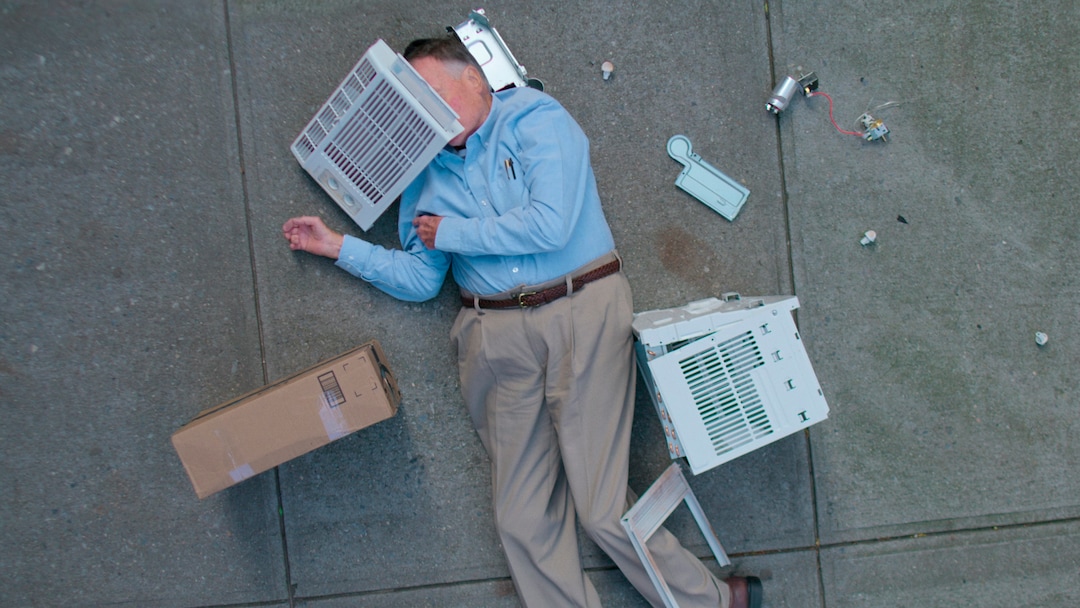 (Photo courtesy of Netflix) Dick Johnson takes part in his own faked death, by a fallen air conditioner, in a scene from "Dick Johnson Is Dead," a documentary directed by his daughter, Kirsten Johnson.
