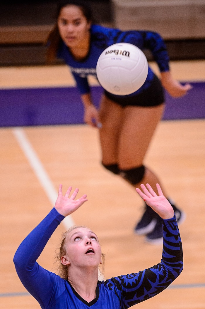 (Trent Nelson  |  The Salt Lake Tribune)  Bingham's Brynlie Huntsman (11) sets the ball to teammate Seleisa Elisaia (10) as North Summit hosts Bingham, high school girls' volleyball in Coalville, Thursday August 17, 2017.