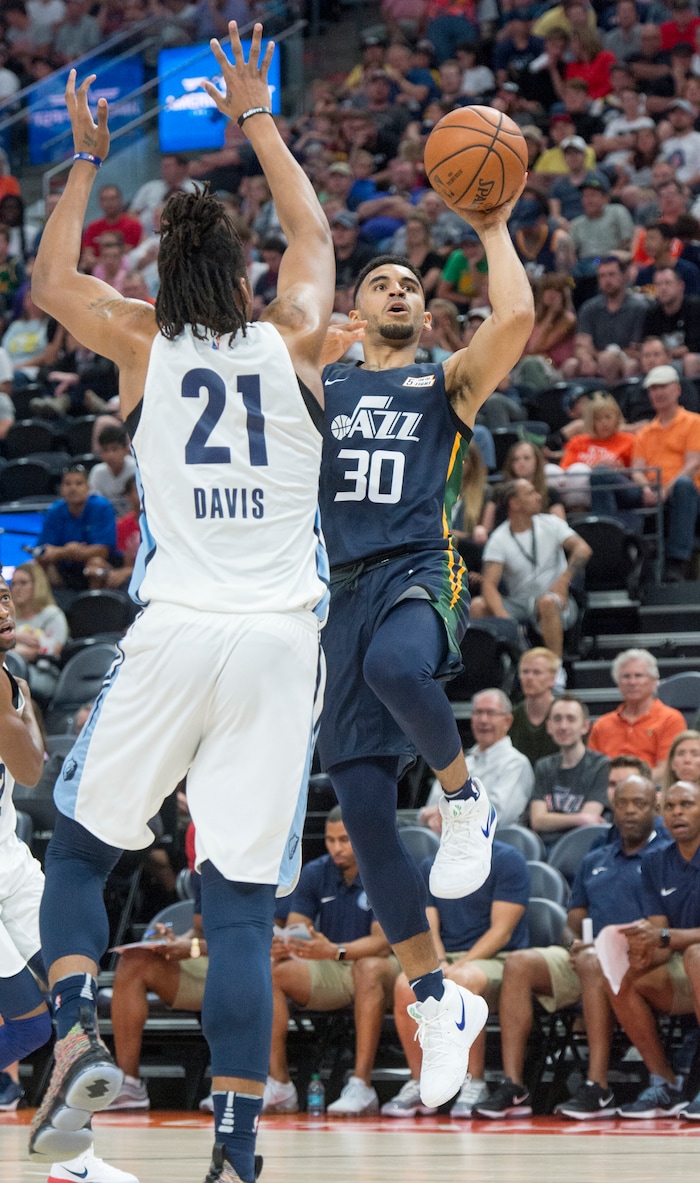 (Rick Egan  |  The Salt Lake Tribune)      Utah Jazz guard Naz Mitrou-Long (30) shoots over Memphis Grizzlies center Deyonta Davis (21) in Utah Jazz summer league action between Utah Jazz and Memphis Grizzlies in Salt Lake City, Tuesday, July 3, 2018.