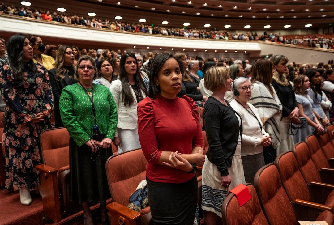 (Rick Egan | The Salt Lake Tribune)    LDS faithful sing a hymn along with the choir during the women's session of LDS General Conference on Saturday, April 2, 2022.
