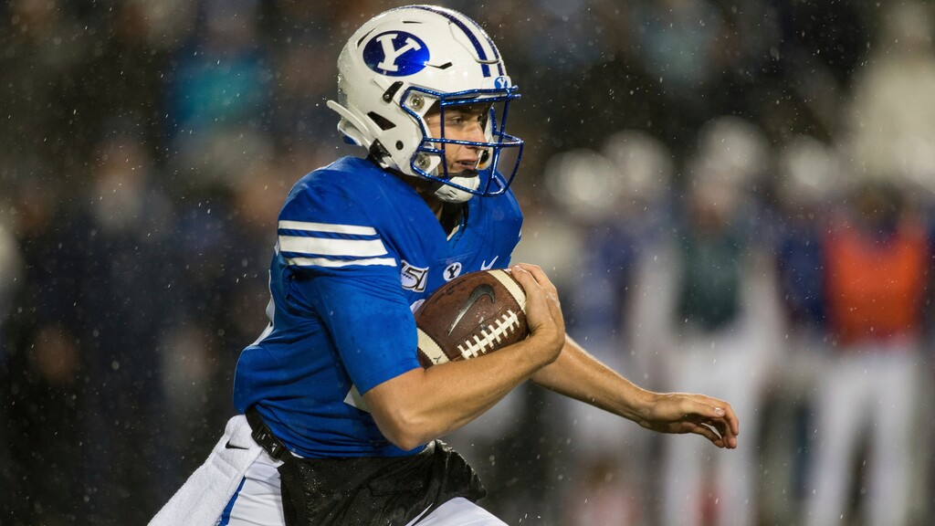 BYU quarterback Baylor Romney runs during the first half of the team's NCAA college football game against Boise State on Saturday, Oct. 19, 2019, in Provo, Utah. (AP Photo/Tyler Tate)